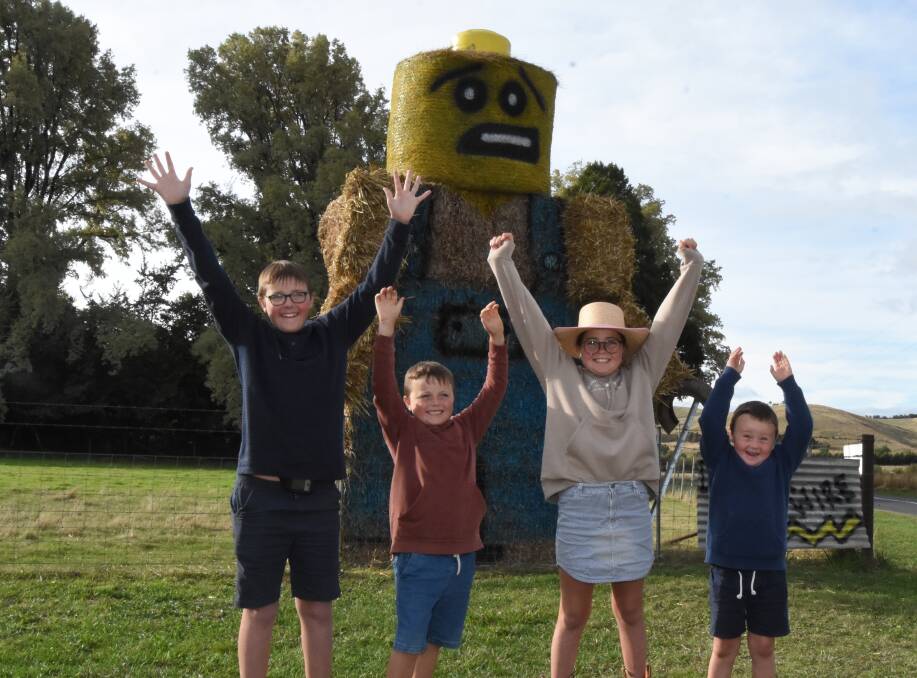 Ayden, Freddy, Cortnee and Kohen Pixton with their winning entry in the Hay Bale section of the Sculptures by the Bush competition. This was the family's first entry.